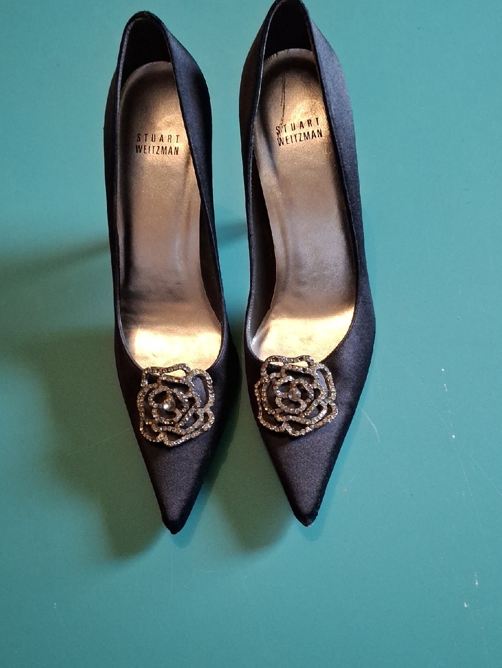 Stuart Weitzman Black Satin Pointed Toe Pumps with Crystal Flower